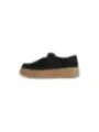Schwarze Wildlederschuhe mit brauner Sohle