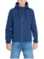 Navy windbreaker and blue jeans