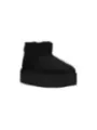 Schwarze Schafhaut-Stiefel mit Plateau