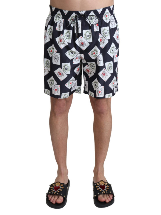 the top günstig Kaufen-Multicolor Card Deck Printed Swim Trunks. Multicolor Card Deck Printed Swim Trunks <![CDATA[Step up your beachwear game with these stunning new-with-tags Dolce & Gabbana swim trunks. Boasting a vibrant multicolor card deck print atop a sleek black backdro