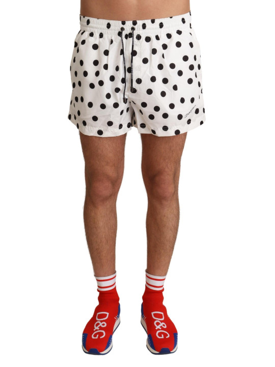 FOR THE günstig Kaufen-Polka Dotted Men's Swim Shorts. Polka Dotted Men's Swim Shorts <![CDATA[Experience comfort with a touch of exclusive Italian design in our Dolce & Gabbana Men’s Swim Shorts. These chic white swim trunks feature a playful black polka dot pattern, offerin