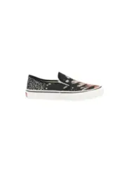 Schwarze und weiße Vans Slip-ons