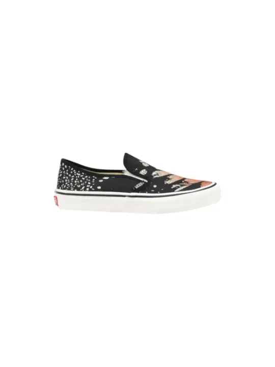Schwarze und weiße Vans Slip-ons