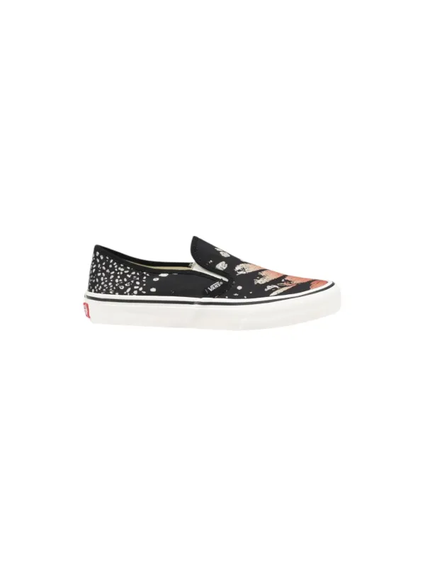 Schwarze und weiße Vans Slip-ons