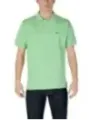 Mintgrünes Lacoste Polohemd mit Jeans