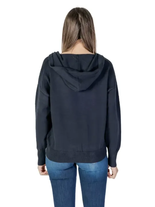 Navy hoodie and blue jeans