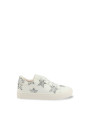 Weiße Sneaker mit silbernem Stern