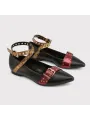 Schwarze Ballerinas mit Goldakzenten