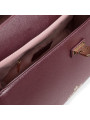 Roter Lederhandtasche mit Goldverschluss