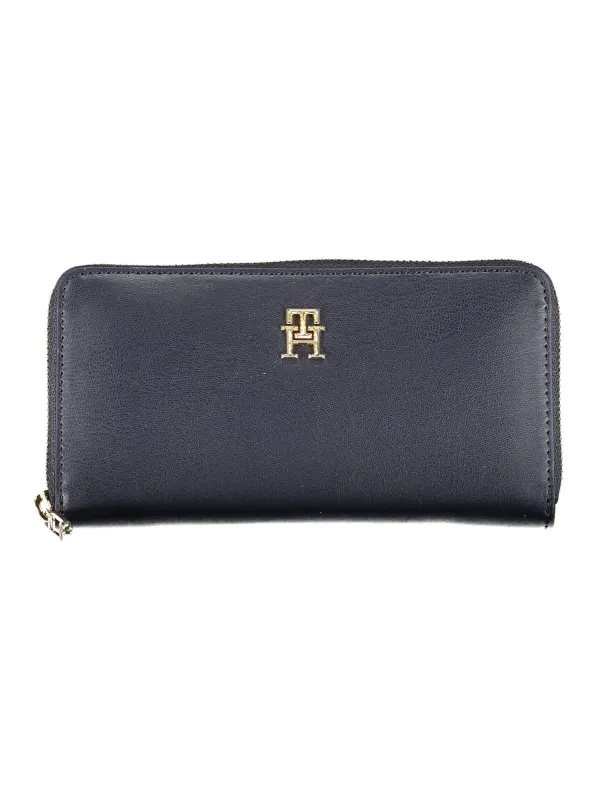 "Tommy Hilfiger Leder-Geldbörse – Stilvoll mit Gold-Details" "Tommy Hilfiger Leder-Geldbörse – Stilvoll mit Gold-Details"