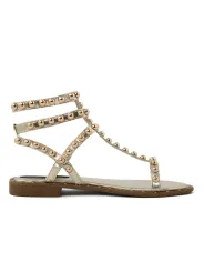 Goldene Sandalette mit Metallnieten
