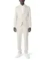 Beiges Anzug mit weißen Schuhen