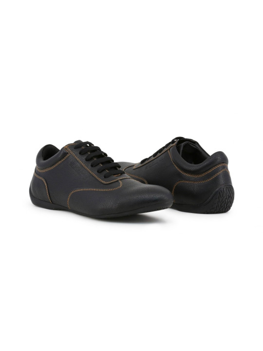 Schwarze Lederschuhe mit gelben Nähten