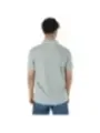 Graues Poloshirt mit Jeans Rückenansicht