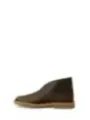 Braune Lederstiefel mit sechseckigen Ösen