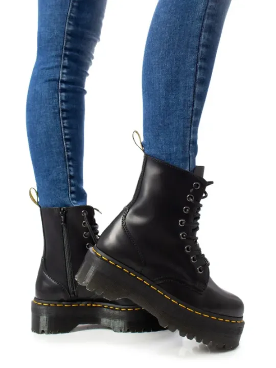 Schwarze Lederstiefel mit gelber Naht