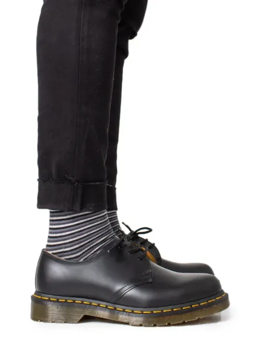 Dunkle braune Dr. Martens Stiefel
